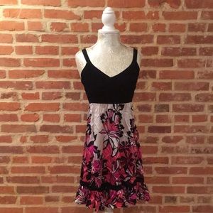 Bebe Satin floral pattern dress w/flirty ruffles.